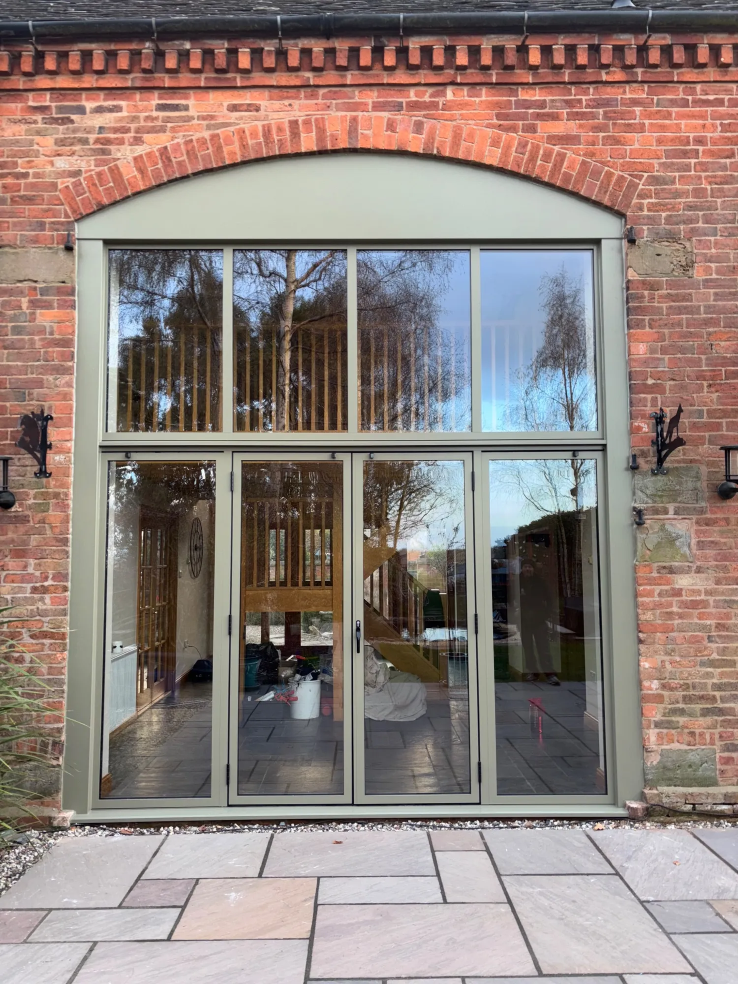 Front view of aluminium bifold doors and glazing installed in Redditch