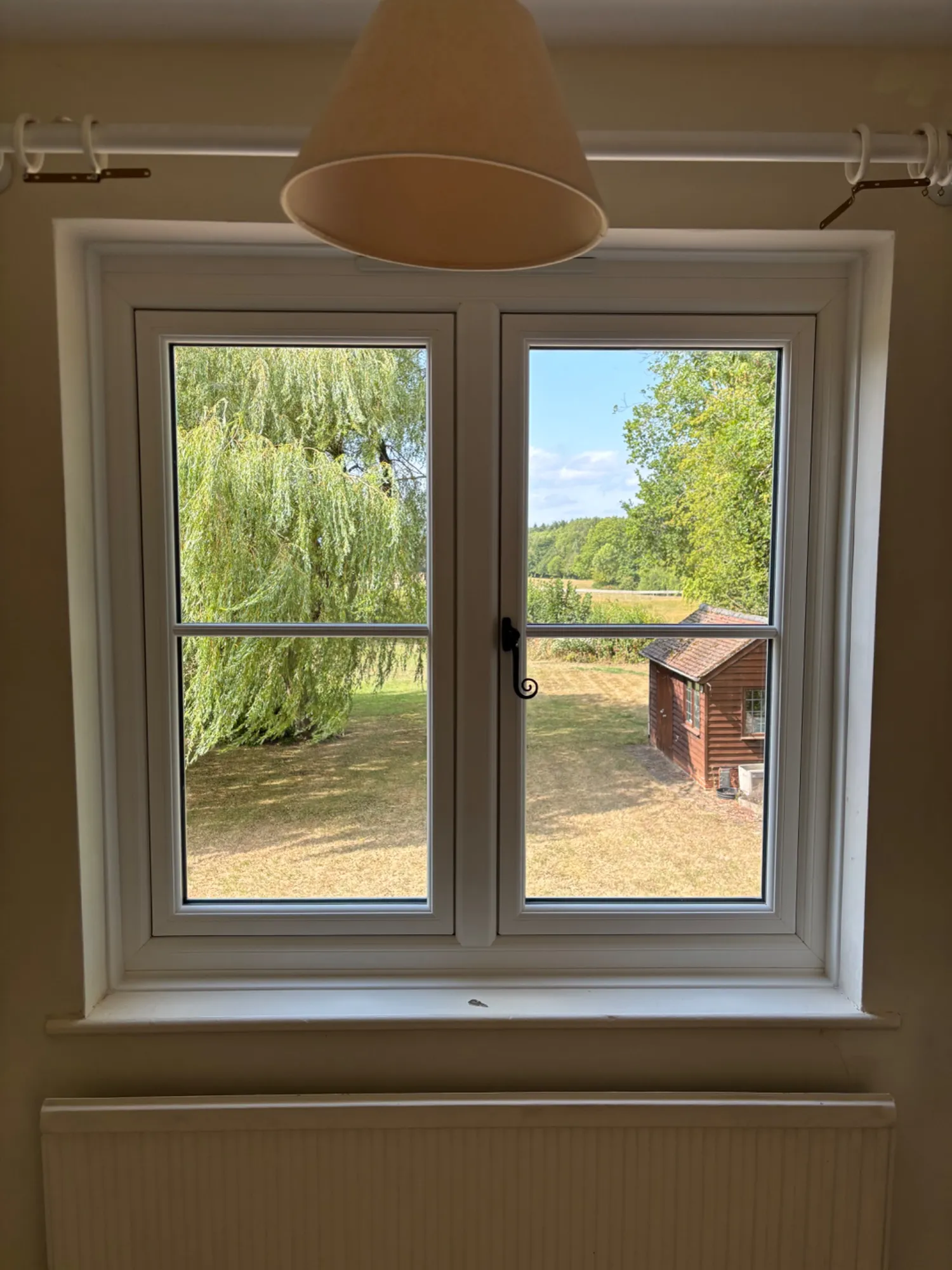 New double-glazed uPVC window with a white interior finish in a Bridgnorth cottage
