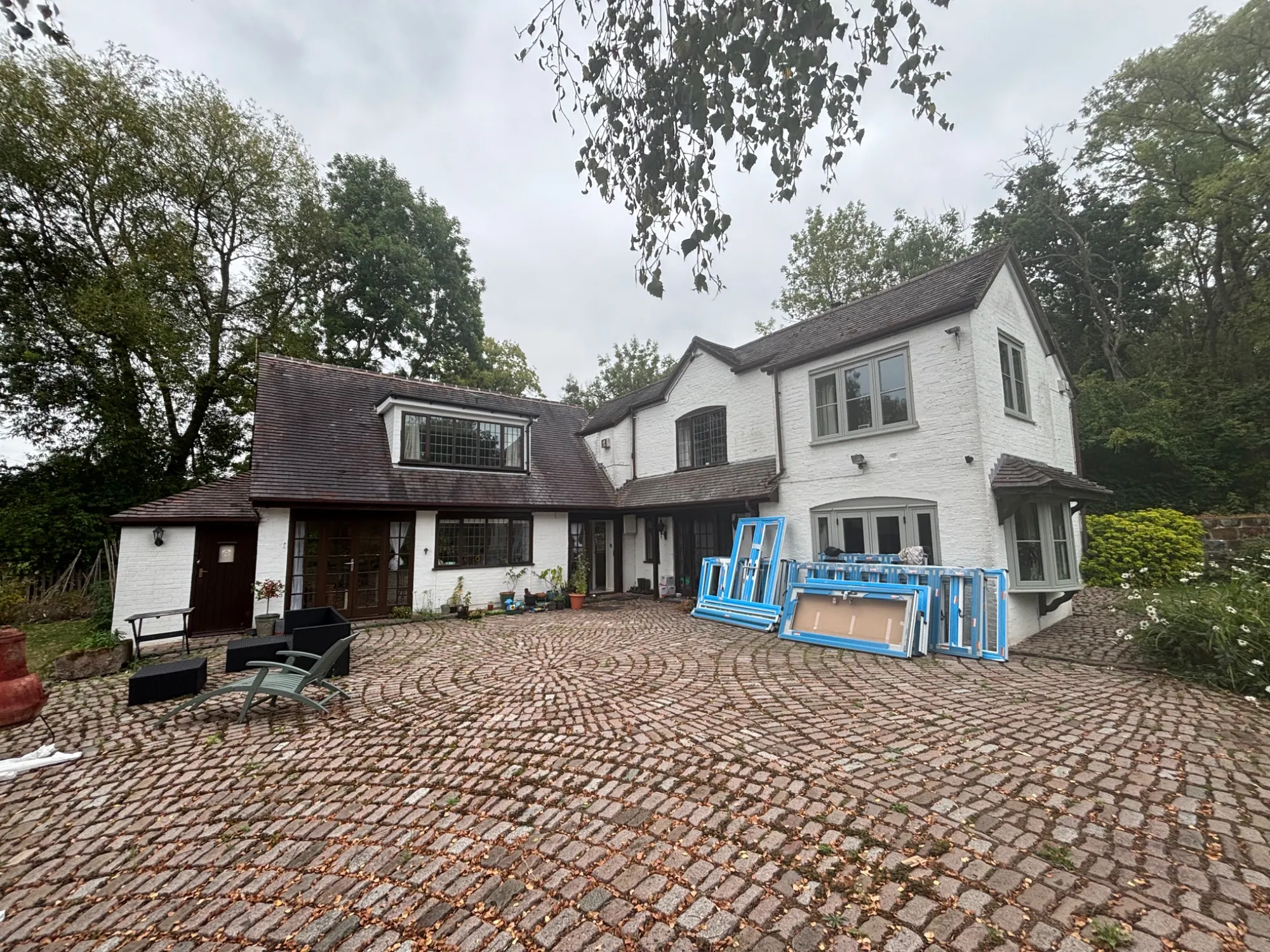 The same Bridgnorth cottage before replacement, with the old wooden windows and doors