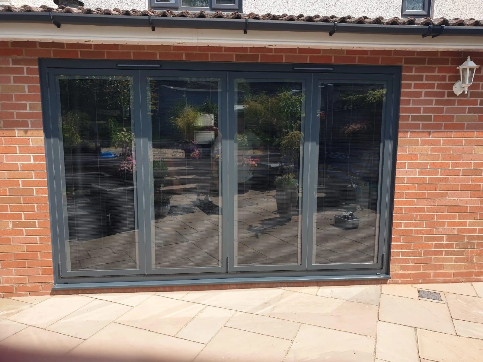 bi-fold door installation by Heritage Windows and Doors in the West Midlands