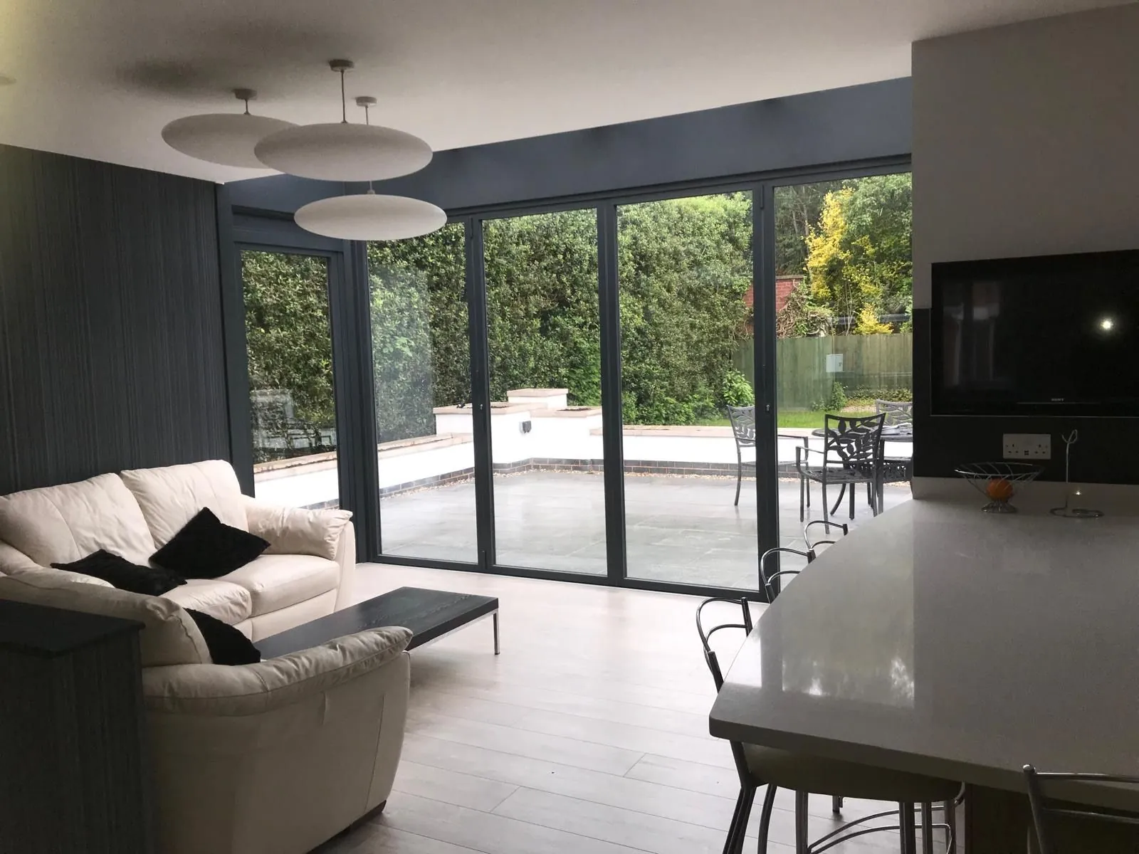 Bi-fold door installation by Heritage Windows and Doors in the West Midlands