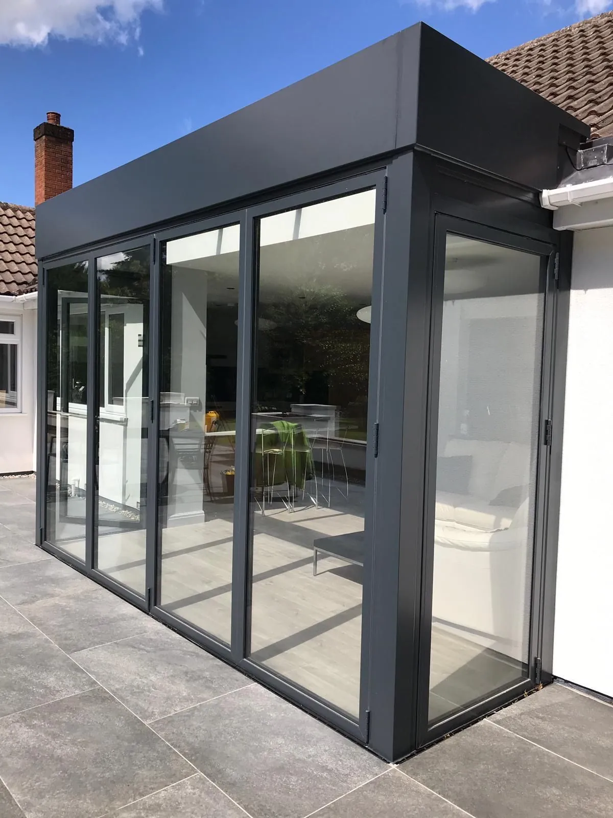 Bi-fold door installation by Heritage Windows and Doors in the West Midlands