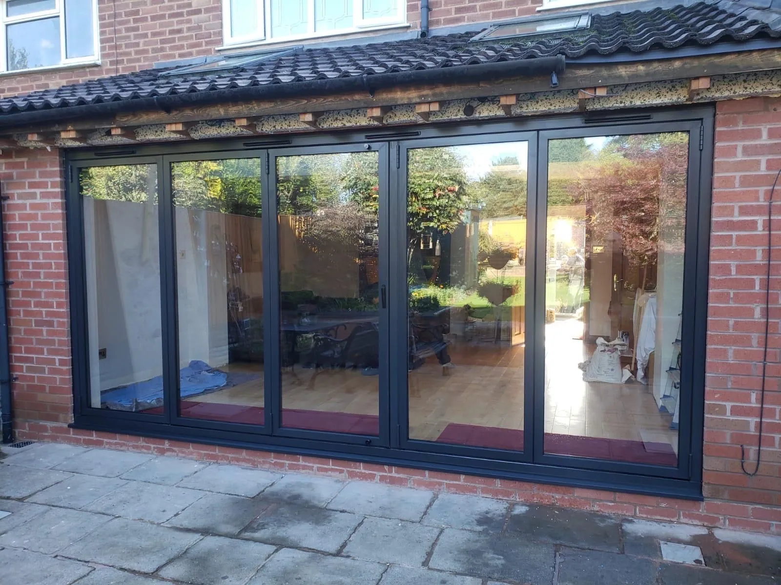Bi-fold door installation by Heritage Windows and Doors in the West Midlands