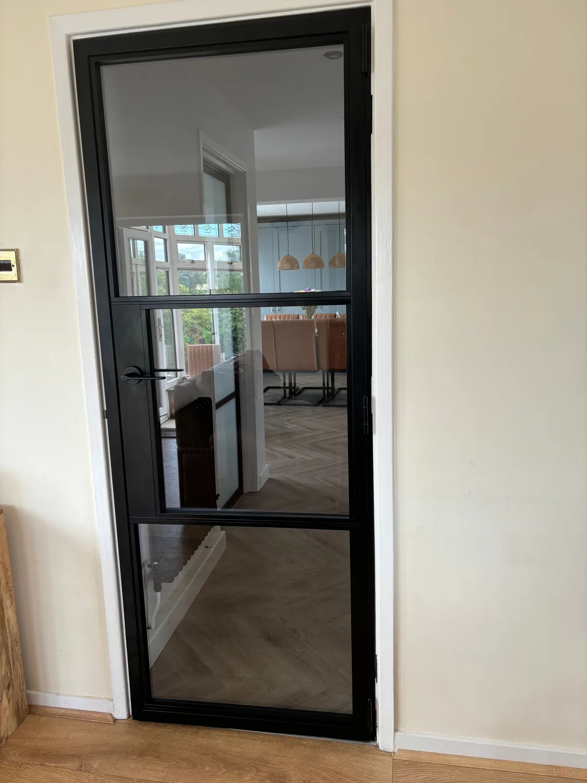 Clear-glazed internal door through to the dining room, by Heritage Windows and Doors in the West Midlands
